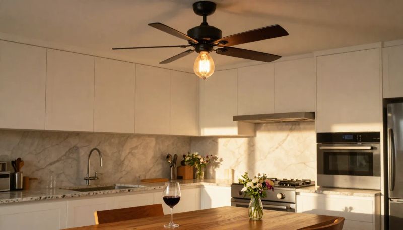 Electrician installing a light fixture in a Lovelady, TX property
