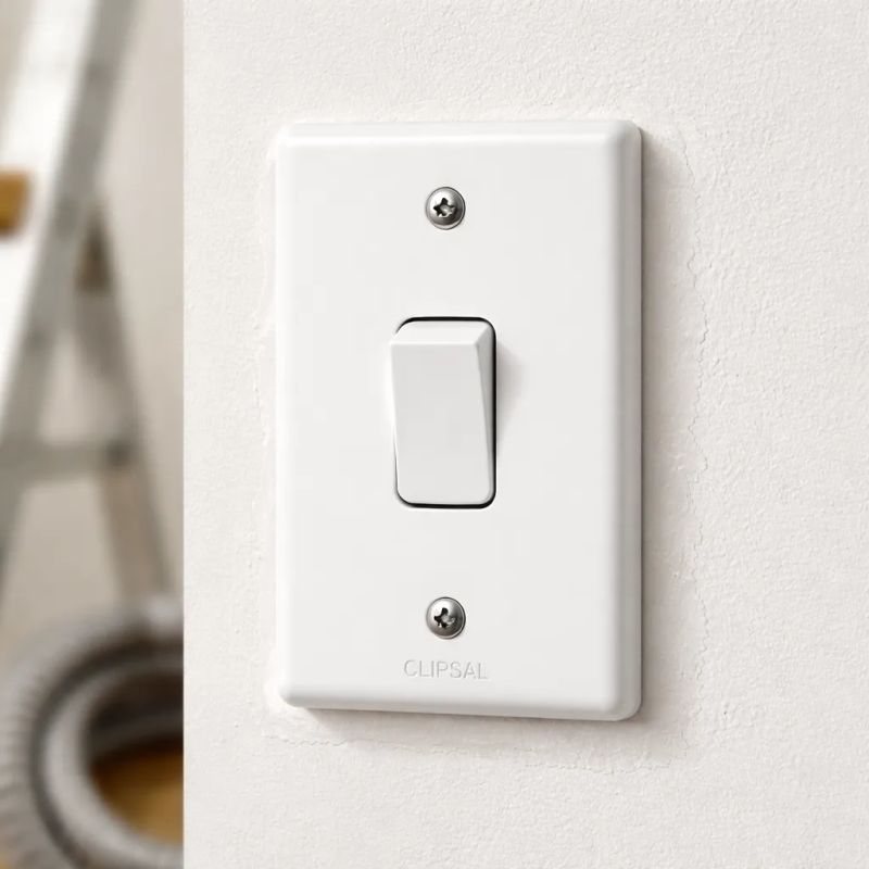 Electrician troubleshooting residential wiring