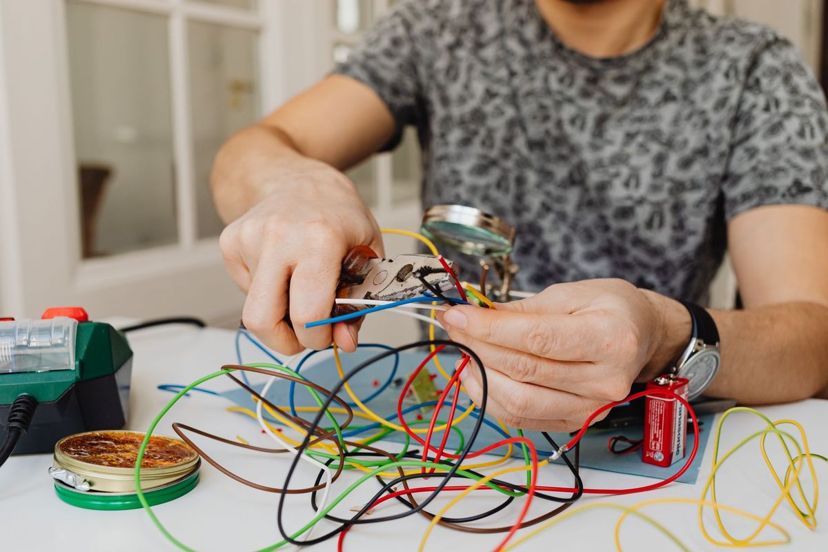 Electrician troubleshooting a residential electrical circuit in Lovelady, Texas